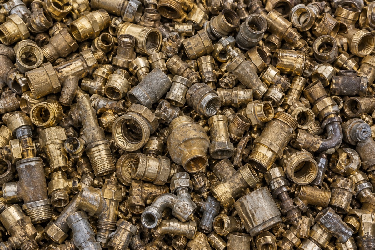 Pile of mixed brass scrap fittings and valves
